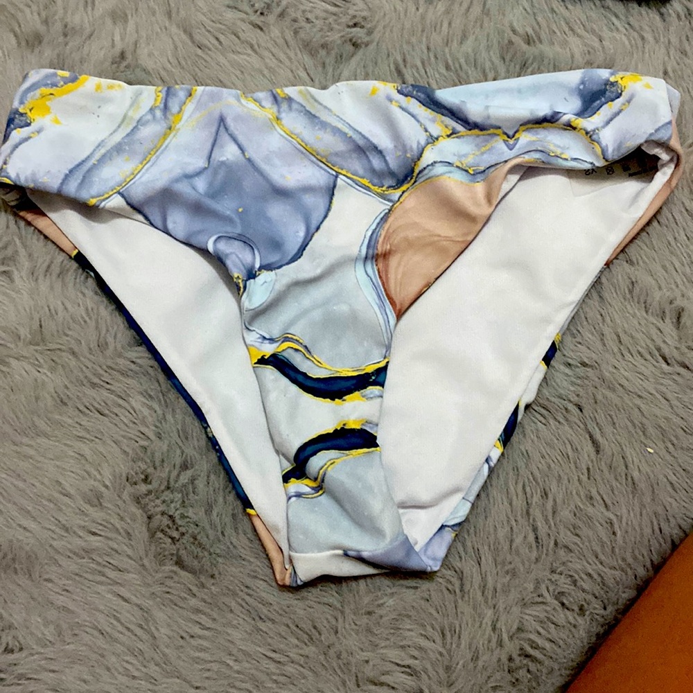A bikini that has a tie around your stomach. I got it from SHEIN I never wore it